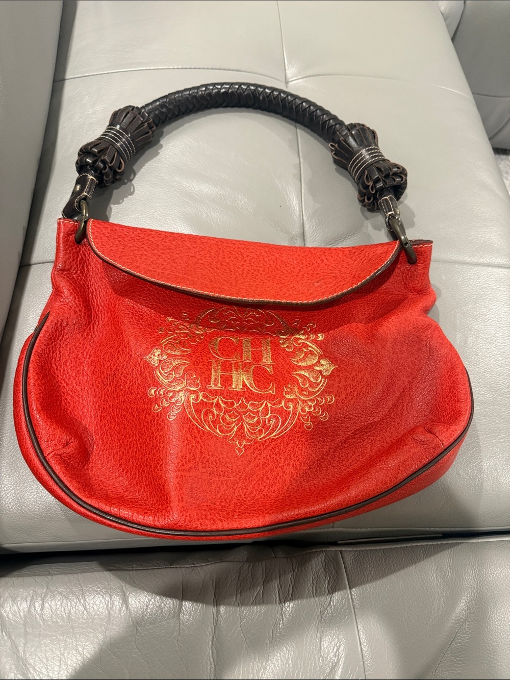 Carolina Herrera Red Shoulder Bag with Braided Dark Brown Handle and Gold Crest